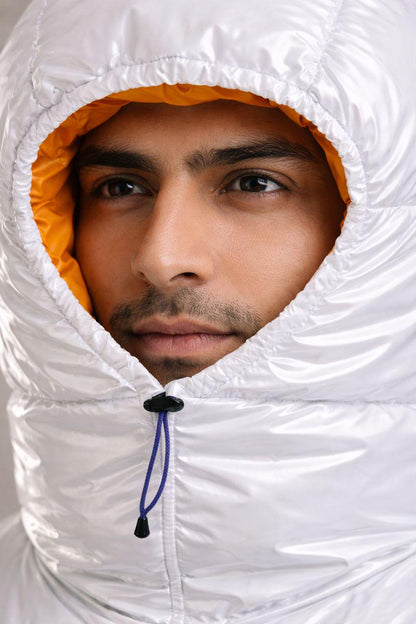 Glossy White Quilted Hood with Vibrant Orange Interior