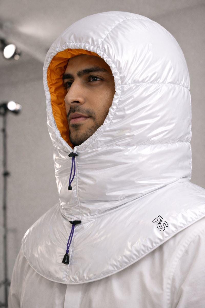 Glossy White Quilted Hood with Vibrant Orange Interior